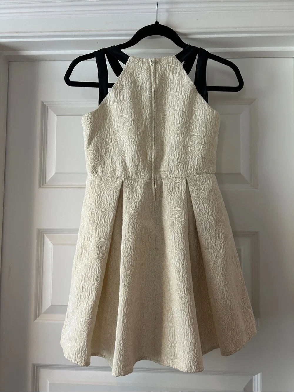 Girls' Cream jacquard fit and flare w/ Black straps, fully lined. Size 10